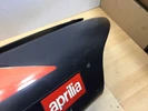 Aprilia Sr 50 Használt Ülésalatti Idom (Karcok Vannak Rajta, Festés Hibás) FEKETE